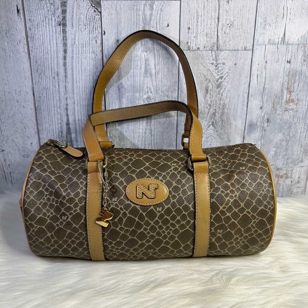 NINA RICCI papillon hand bag